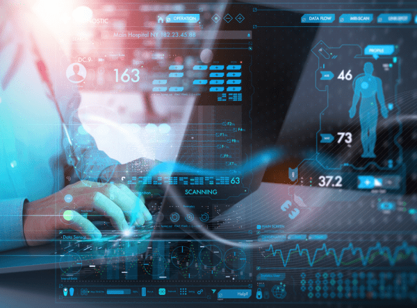 A person types on a keyboard, overlaid with blue, futuristic medical data graphics. Includes heart rate, body scan, and biometric details, conveying a high-tech, clinical atmosphere.